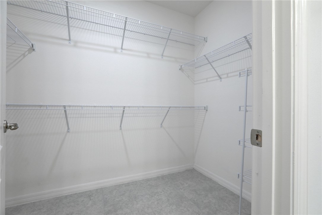 406 Easy Street Sebastian, FL 32958 - Photo 27 of 36 a view of a room with racks on the wall
