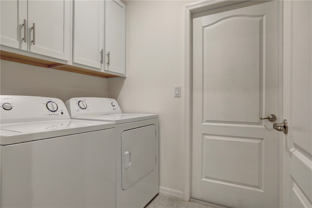 406 Easy Street Sebastian, FL 32958 - Photo 35 of 36 a utility room with dryer and washer