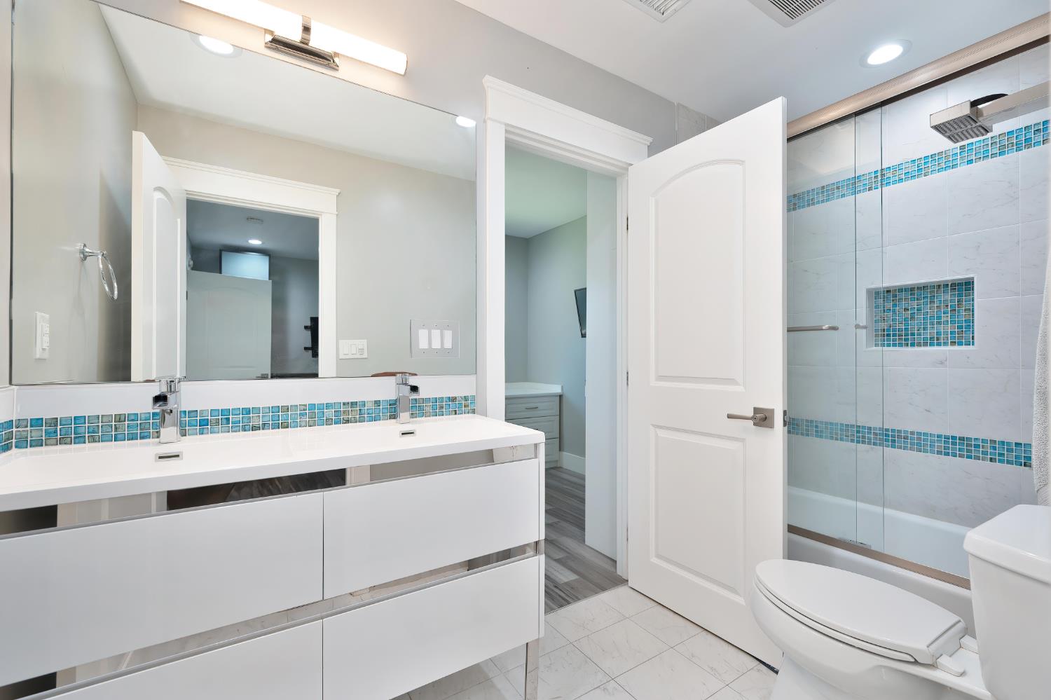 3468 Rolph Way El Dorado Hills, CA 95762 - Photo 16 of 51 a bathroom with a sink a toilet and shower