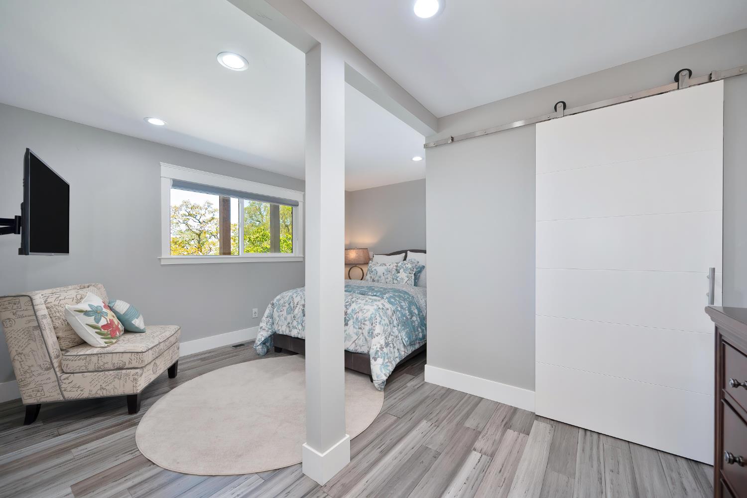 3468 Rolph Way El Dorado Hills, CA 95762 - Photo 24 of 51 a living room with furniture and a wooden floor
