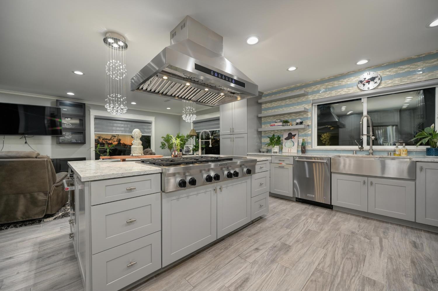 3468 Rolph Way El Dorado Hills, CA 95762 - Photo 6 of 51 a kitchen with white cabinets and sink