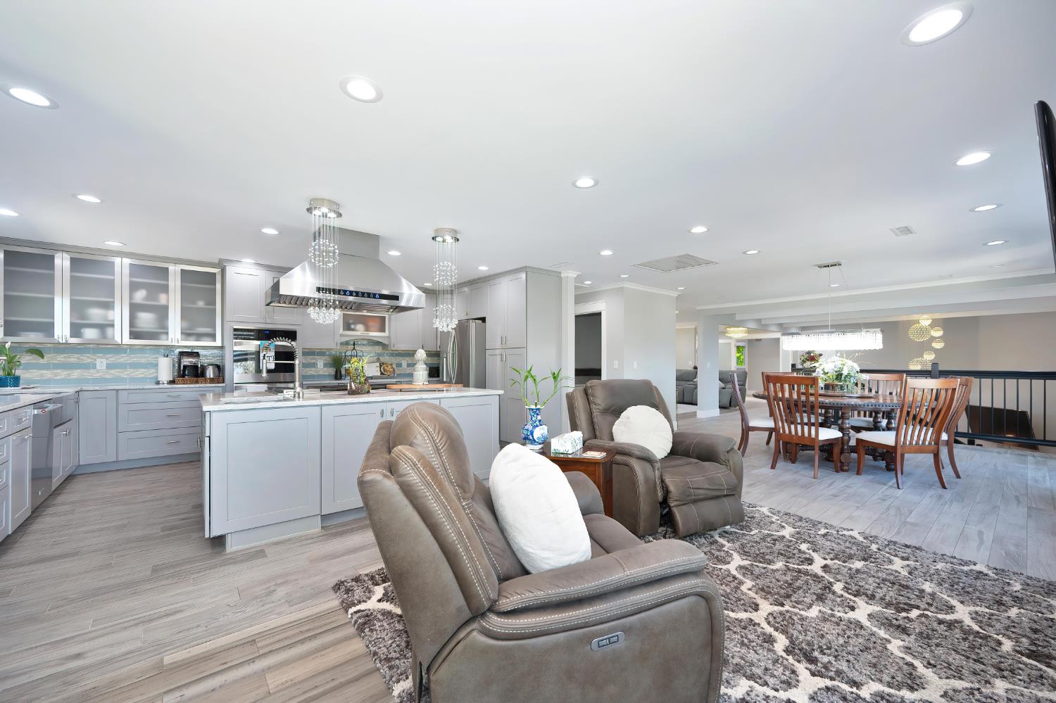 3468 Rolph Way El Dorado Hills, CA 95762 - Photo 7 of 51 a living room with furniture a dining table and kitchen view