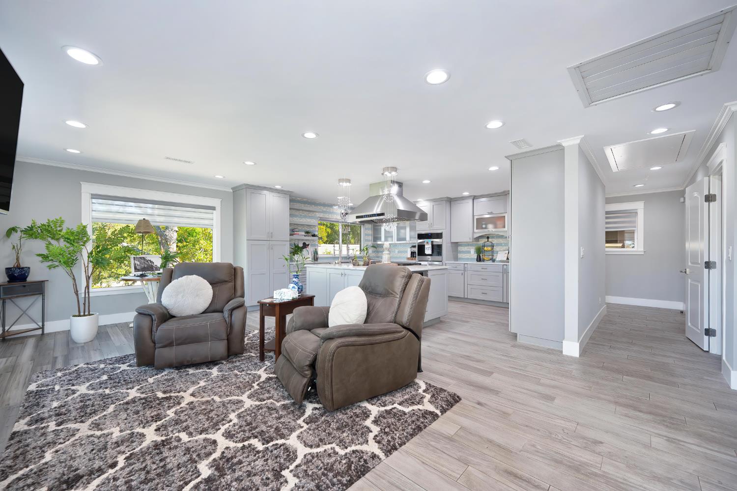 3468 Rolph Way El Dorado Hills, CA 95762 - Photo 9 of 51 a living room with furniture and a view of kitchen