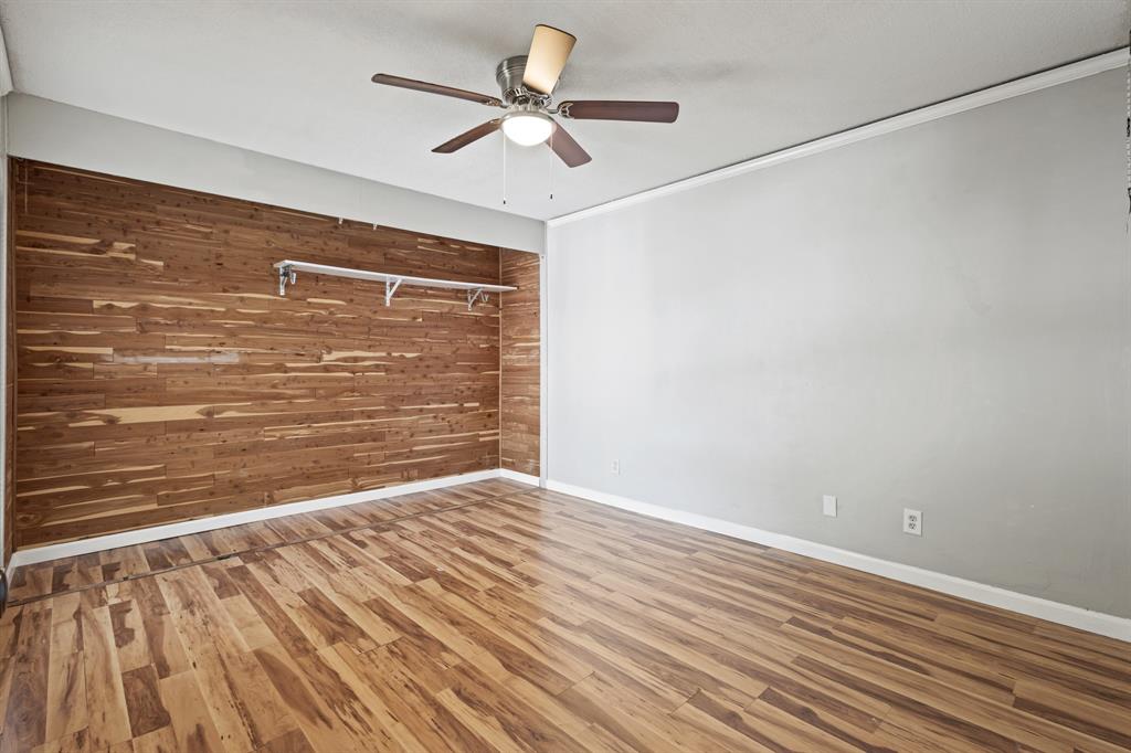 5634 Boca Raton Boulevard, Unit 209 Fort Worth, TX 76112 - Photo 8 of 24 a view of empty room with wooden floor