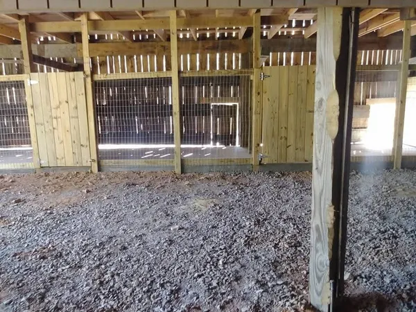 a view of a brick house with a large window