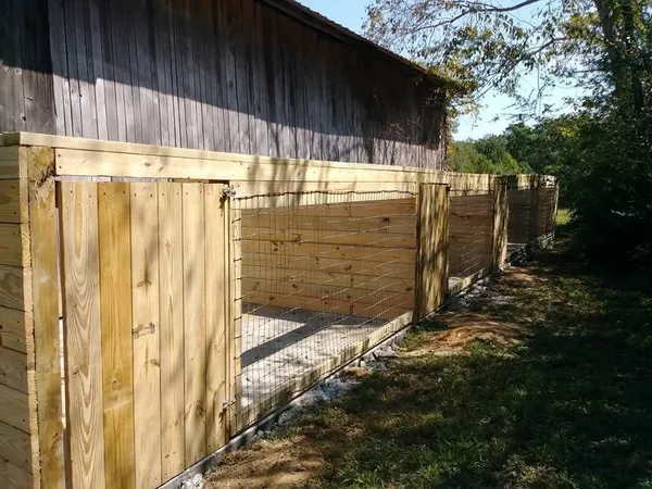 a view of a backyard of the house