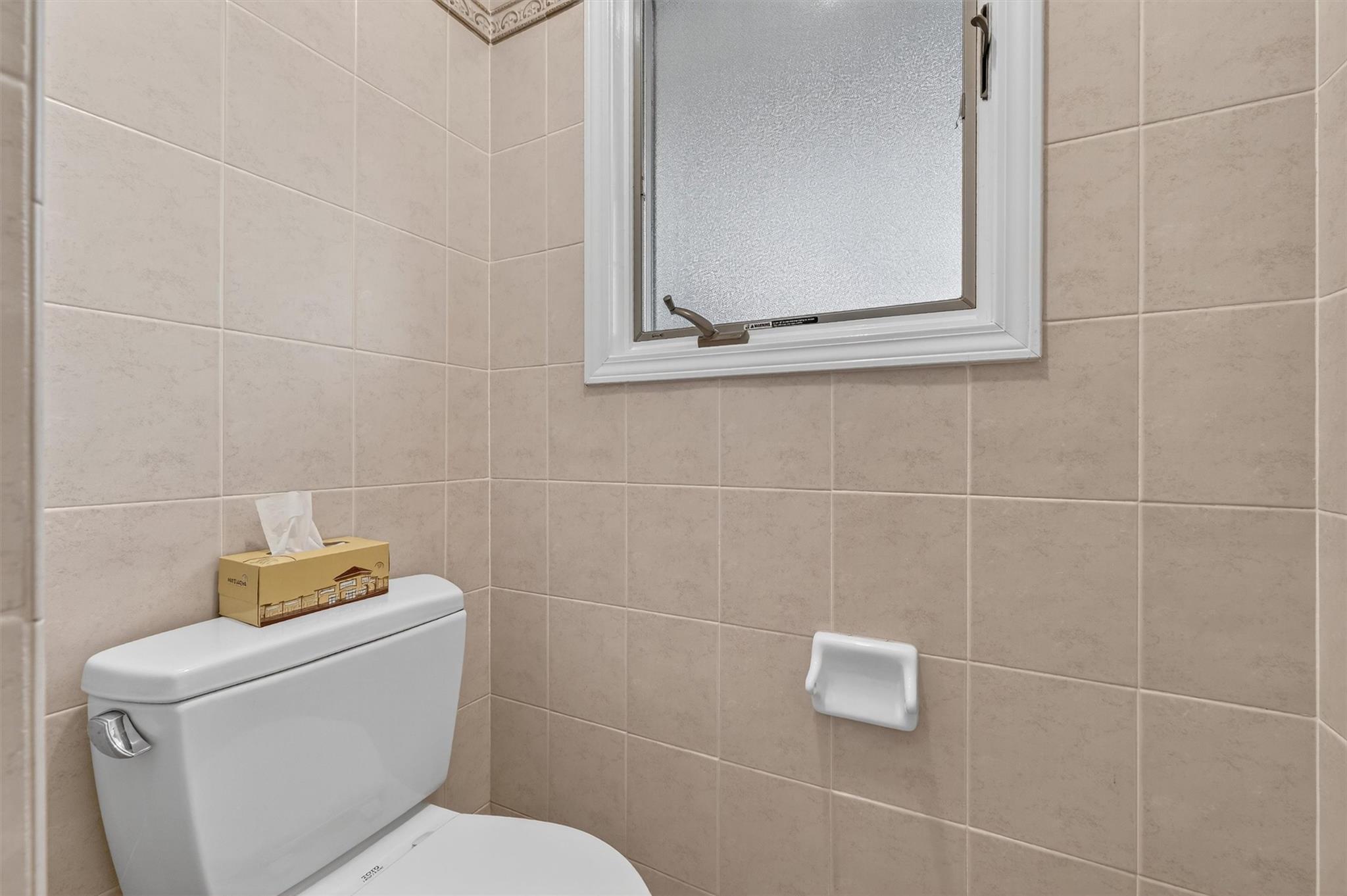 15 Dr Frank Road Spring Valley, NY 10977 - Photo 16 of 50 Bathroom featuring toilet and tile walls
