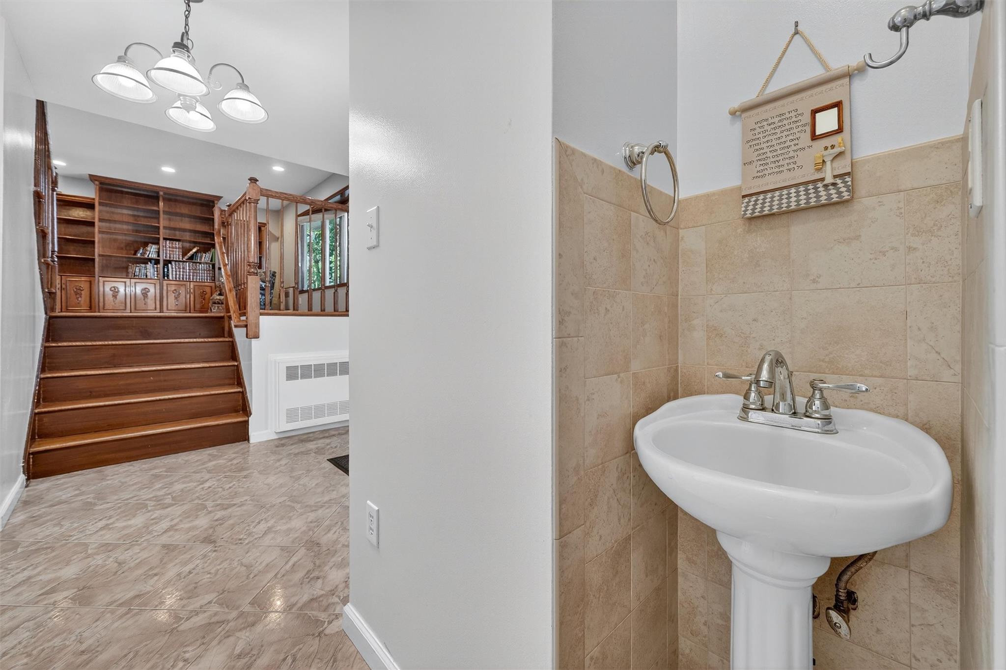 15 Dr Frank Road Spring Valley, NY 10977 - Photo 17 of 50 sink outside bathroom