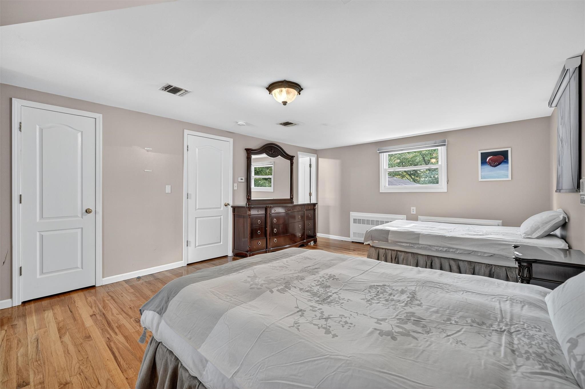 15 Dr Frank Road Spring Valley, NY 10977 - Photo 28 of 50 Bedroom with radiator and light wood finished floors