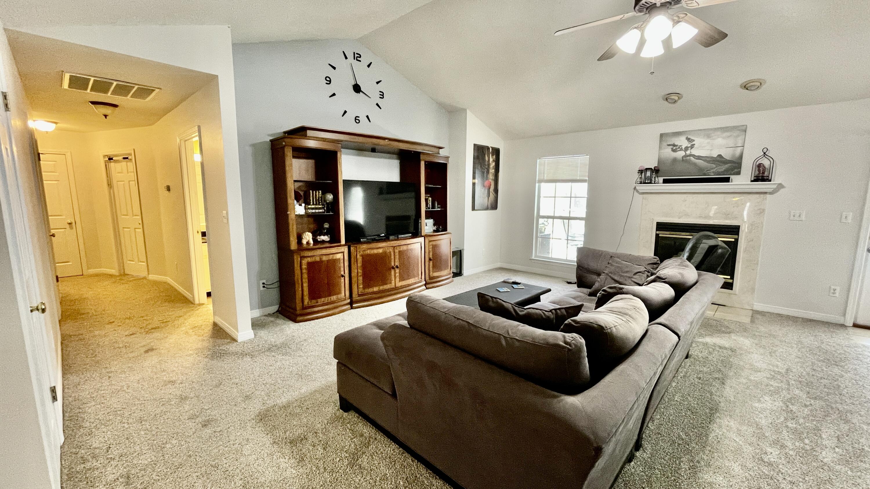 4467 Kingslynn Road Niceville, FL 32578 - Photo 15 of 28 a living room with furniture and a large window
