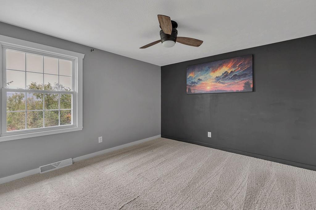 4173 River Road Beaver Falls, PA 15010 - Photo 20 of 33 This bedroom also has great window space for natural lighting. Nice size room with accent wall.