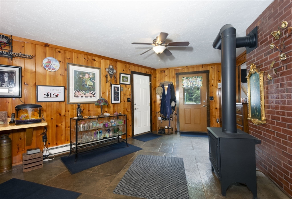 926 Old Turnpike Road Oakham, MA 01068 - Photo 14 of 42 a bedroom with furniture and large window