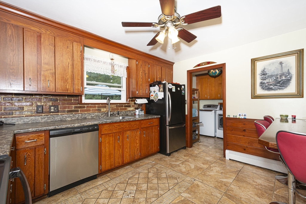 926 Old Turnpike Road Oakham, MA 01068 - Photo 21 of 42 a view of kitchen with stainless steel appliances granite countertop cabinets and a sink