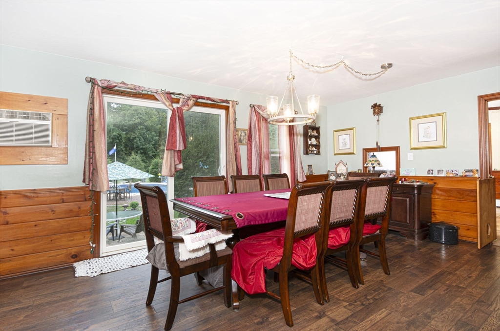 926 Old Turnpike Road Oakham, MA 01068 - Photo 23 of 42 a dining room with furniture and wooden floor