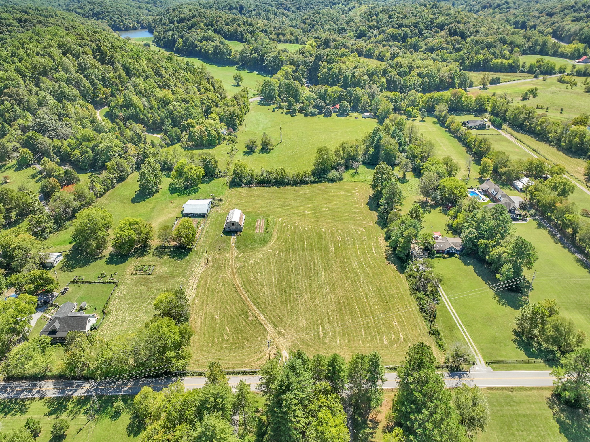 5110 Old Harding Road Franklin, TN 37064 - Photo 17 of 21 an aerial view of residential houses with outdoor space and trees all around