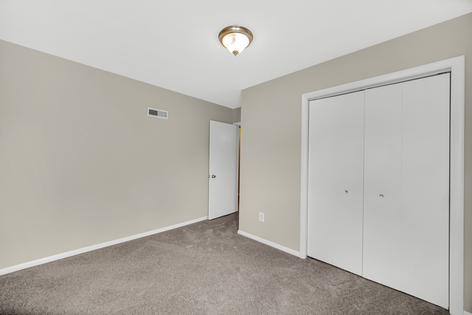 1455 Reckinger Road Aurora, IL 60505 - Photo 16 of 26 a view of an empty room with a window