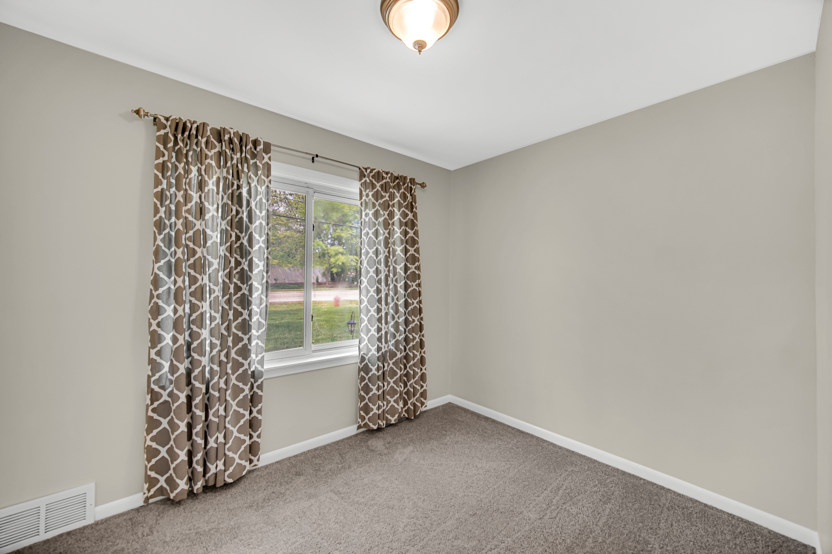 1455 Reckinger Road Aurora, IL 60505 - Photo 18 of 26 a view of an empty room with windows