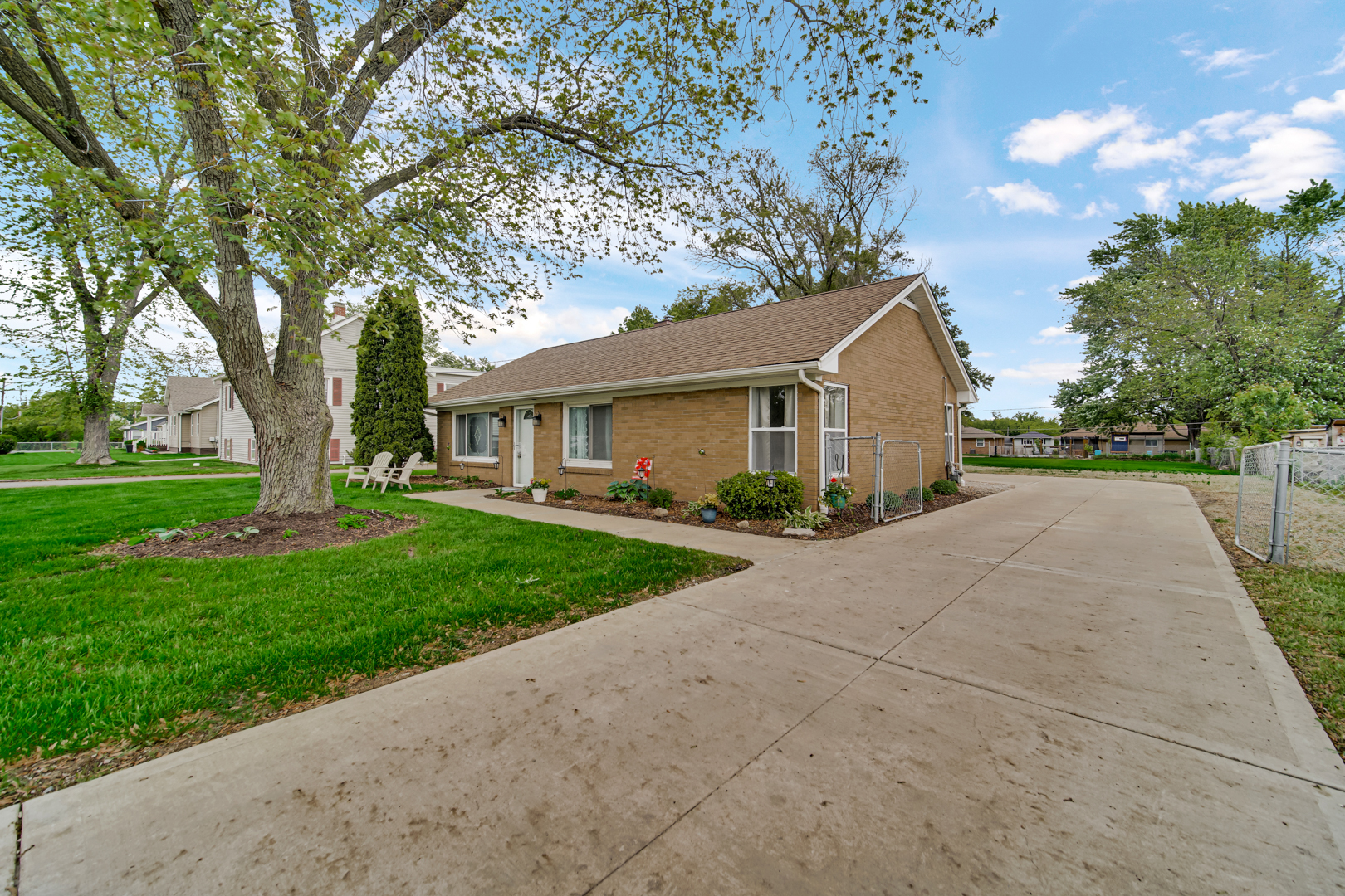 1455 Reckinger Road Aurora, IL 60505 - Photo 2 of 26 front view of a house with a yard