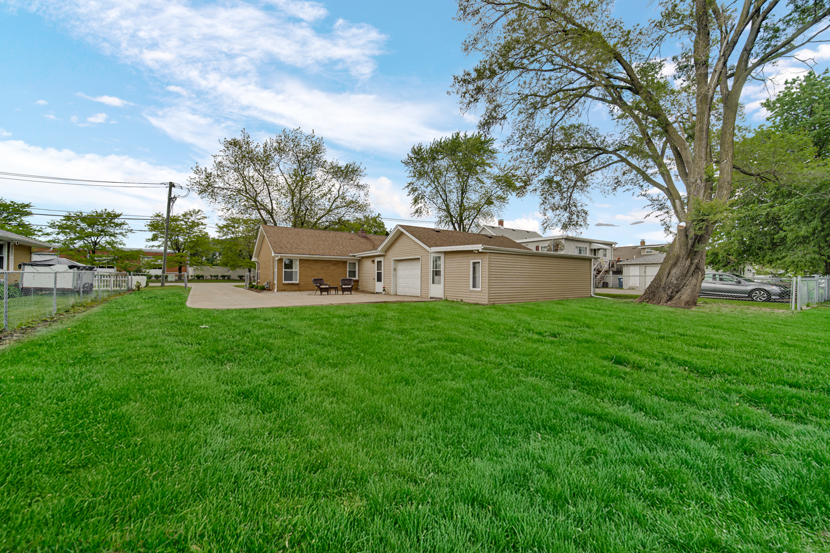 1455 Reckinger Road Aurora, IL 60505 - Photo 5 of 26 a house view with a outdoor space
