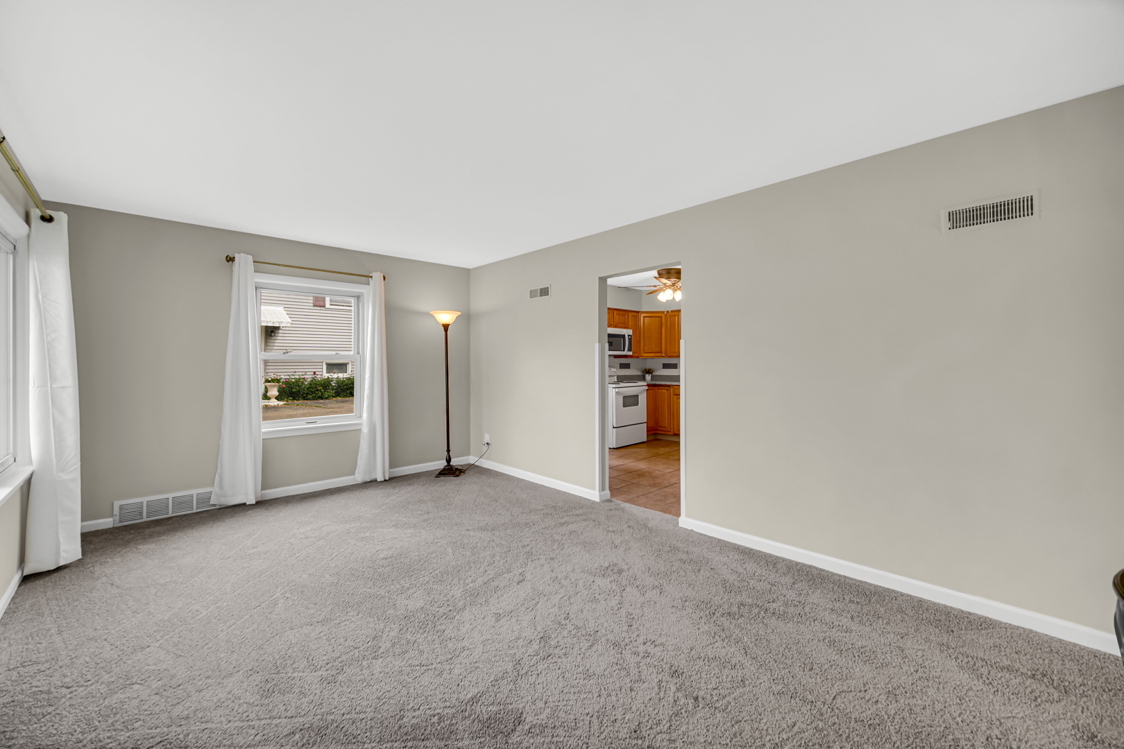 1455 Reckinger Road Aurora, IL 60505 - Photo 6 of 26 a view of an empty room with a window