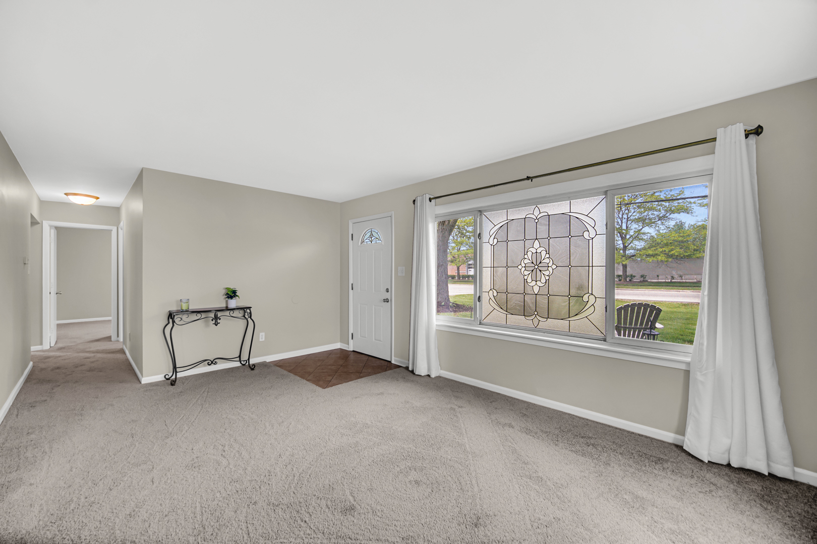 1455 Reckinger Road Aurora, IL 60505 - Photo 7 of 26 a view of an empty room with a window