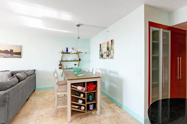 a living room with furniture and a bed