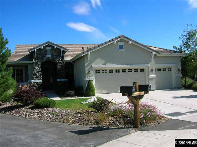 513 Spirit Ridge Court Reno, NV 89511 - Photo 1 of 13 a front view of a house with a yard