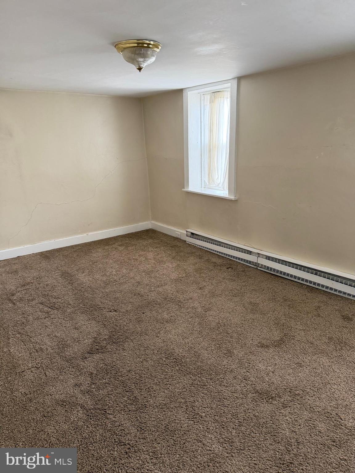 284 West State Street Doylestown, PA 18901 - Photo 6 of 11 an empty room with a window