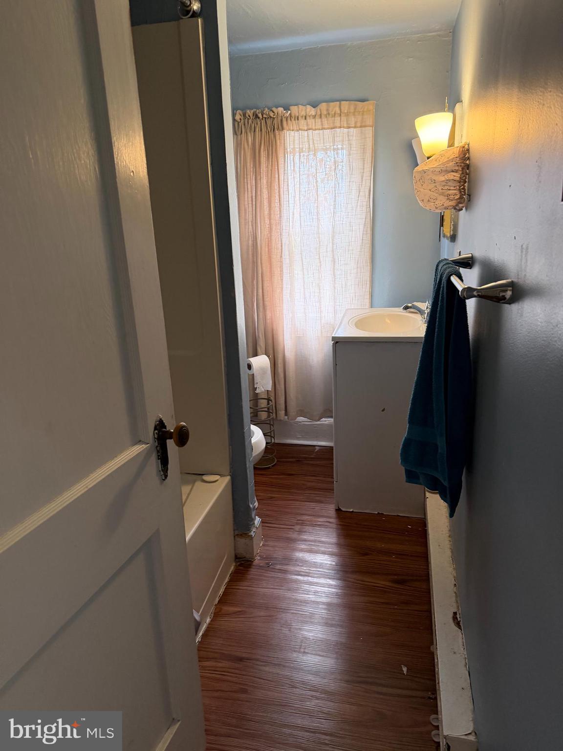 284 West State Street Doylestown, PA 18901 - Photo 8 of 11 a view of bathroom with bathtub and wooden floor