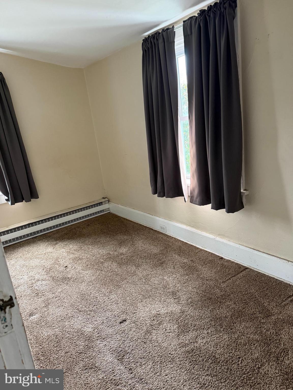 284 West State Street Doylestown, PA 18901 - Photo 9 of 11 a view of a closet with wooden floor