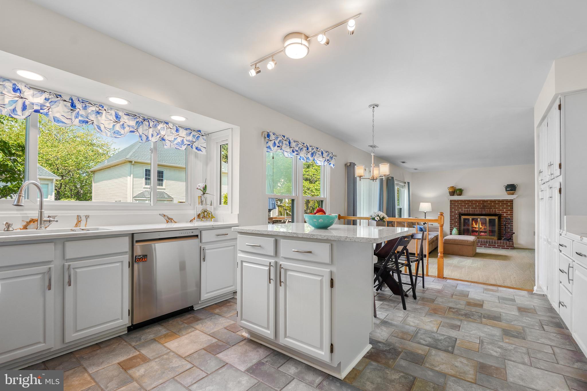130 Englefield Drive Gaithersburg, MD 20878 - Photo 12 of 33 a kitchen with sink cabinets and outdoor view