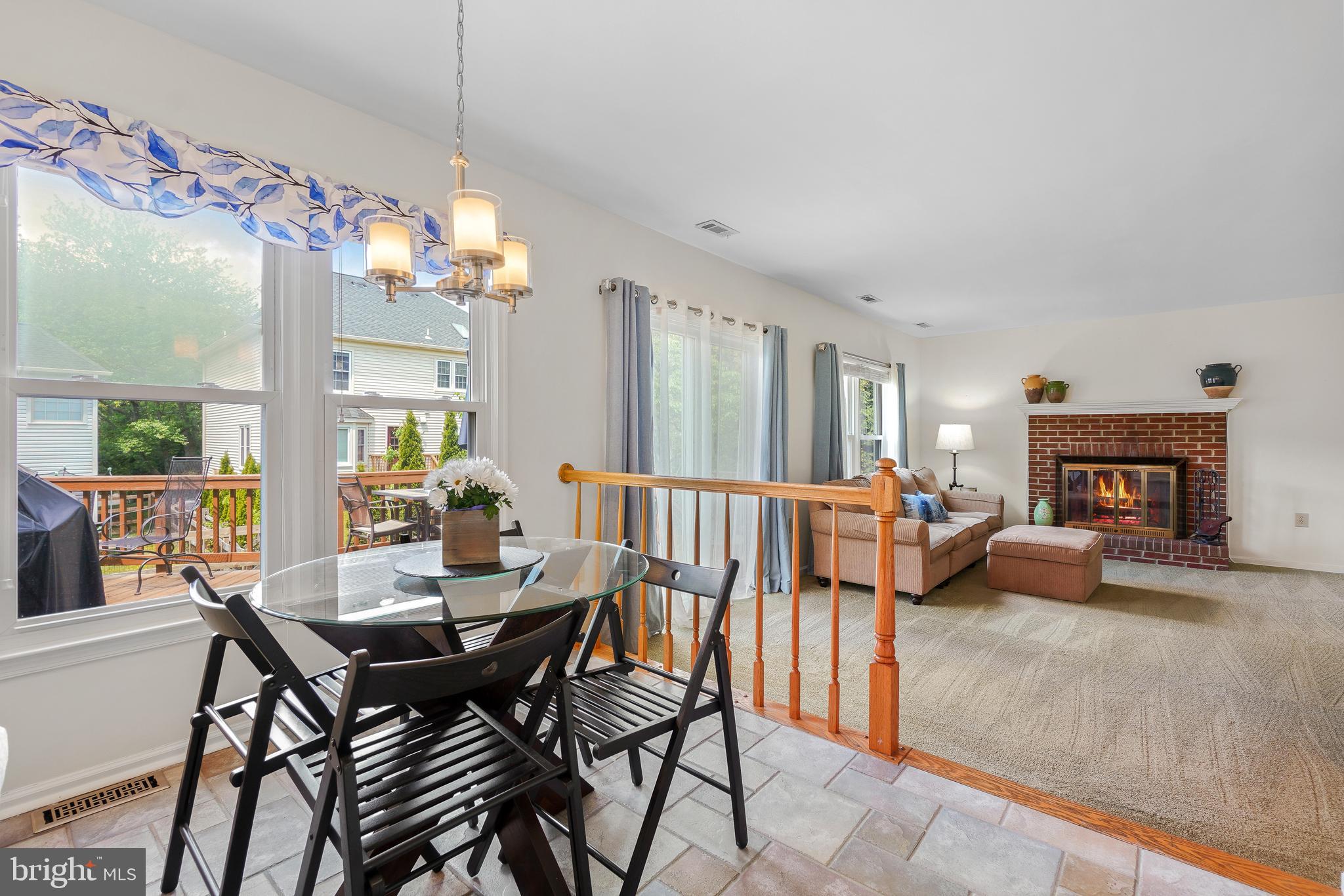 130 Englefield Drive Gaithersburg, MD 20878 - Photo 13 of 33 a view of a dining room with furniture wooden floor and chandelier