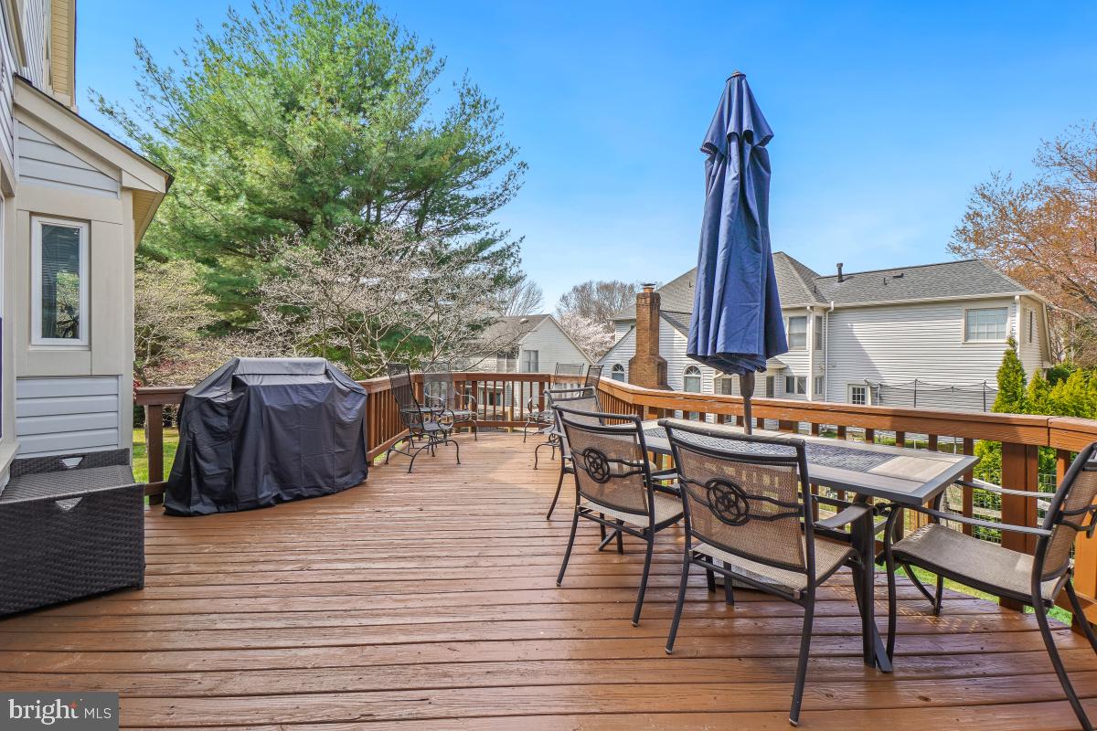 130 Englefield Drive Gaithersburg, MD 20878 - Photo 30 of 33 a view of a terrace with wooden floor and outdoor seating