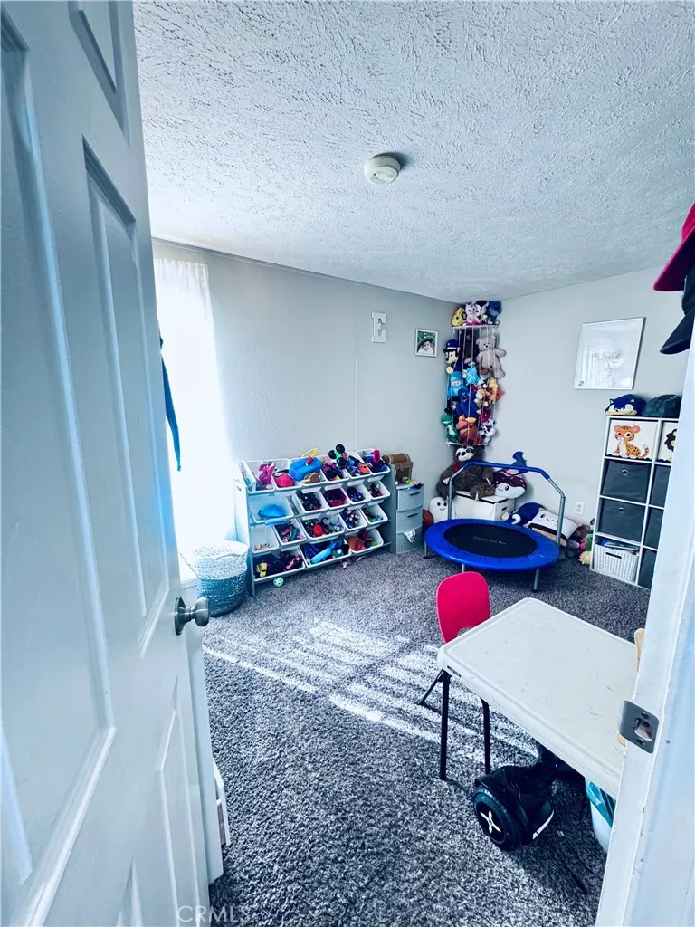 250 North Linden Avenue, Unit 250 Rialto, CA 92376 - Photo 18 of 29 a view of a room with toys and toys