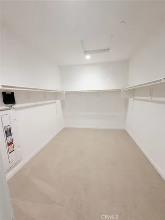 a spacious bathroom with a double vanity sink mirror and a bathtub