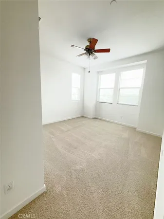 a spacious bathroom with a sink a mirror and a vanity