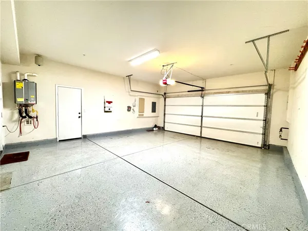 a view of a room with cabinet and mirrors