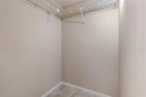 a view of a room with racks on the wall