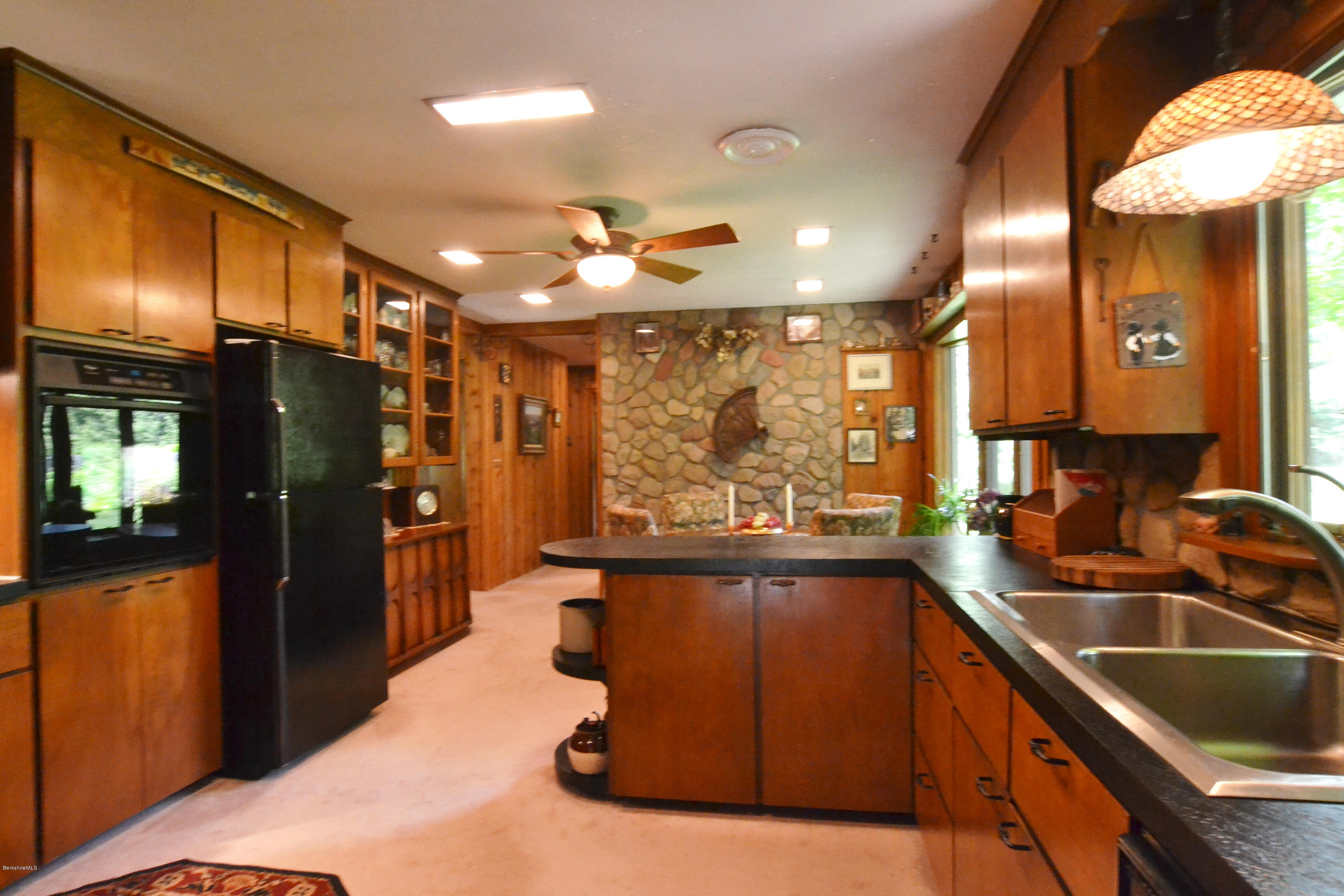 1691 Dublin Road Richmond, MA 01254 - Photo 12 of 35 a kitchen with a sink appliances cabinets and a large window