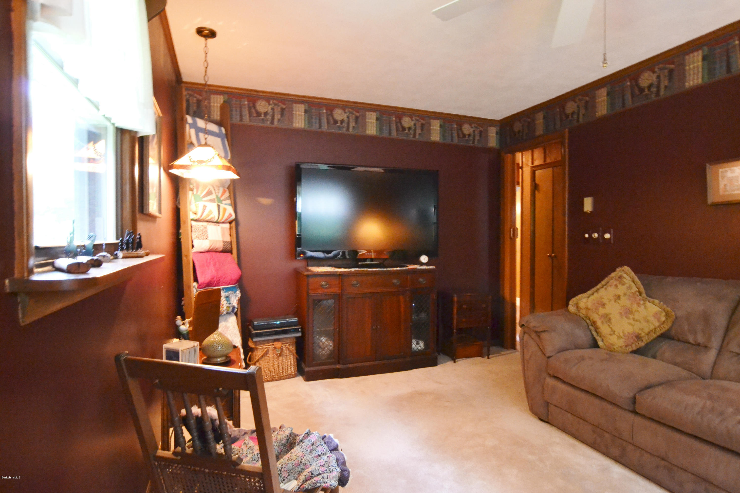 1691 Dublin Road Richmond, MA 01254 - Photo 21 of 35 a living room with furniture and a flat screen tv