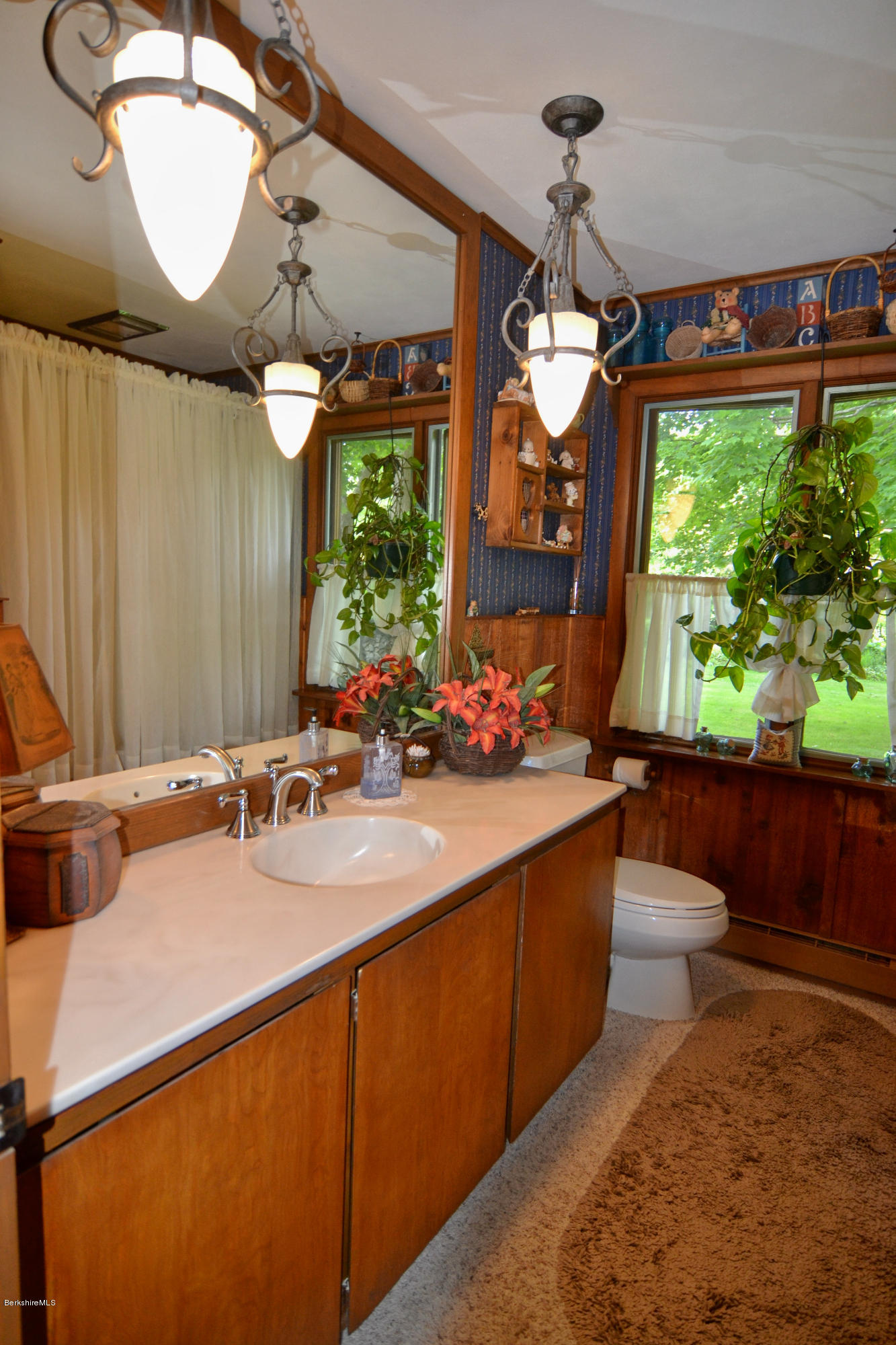 1691 Dublin Road Richmond, MA 01254 - Photo 22 of 35 a bathroom with a sink mirror and window