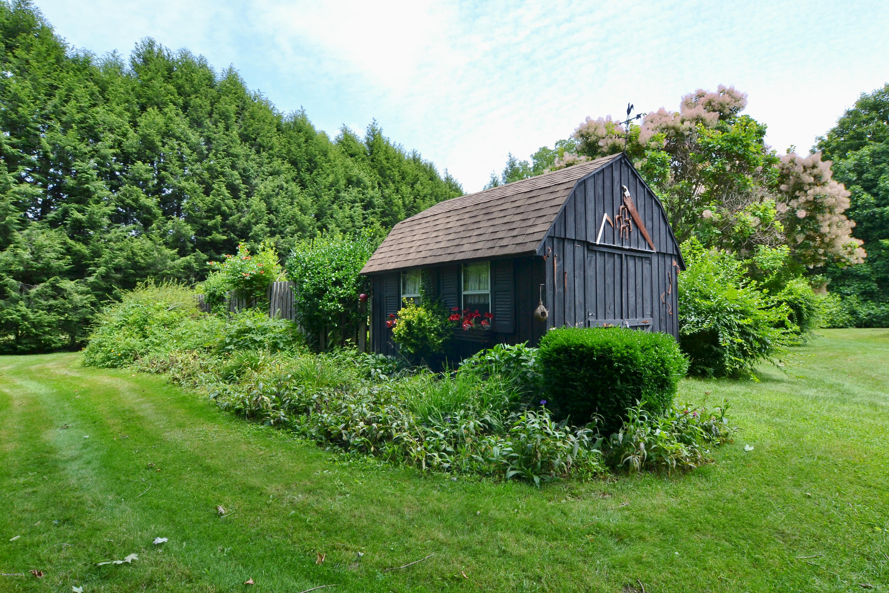 1691 Dublin Road Richmond, MA 01254 - Photo 31 of 35 a view of a house with garden and yard