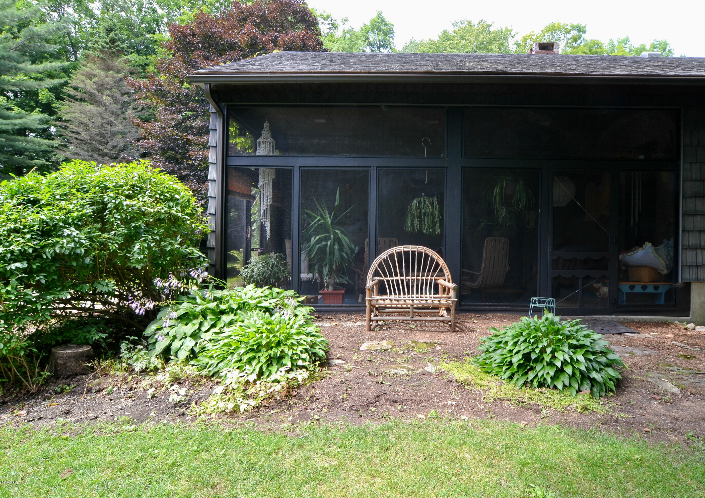 1691 Dublin Road Richmond, MA 01254 - Photo 33 of 35 a front view of a house with garden