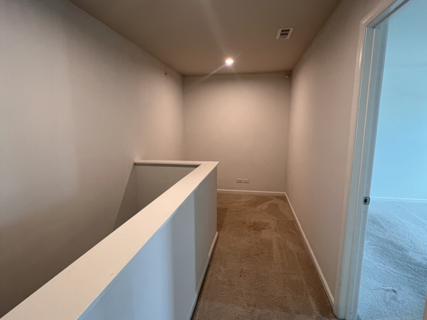 3423 Helene Rieder Drive, Unit 3423 Montgomery, IL 60538 - Photo 7 of 9 a view of hallway with stairs