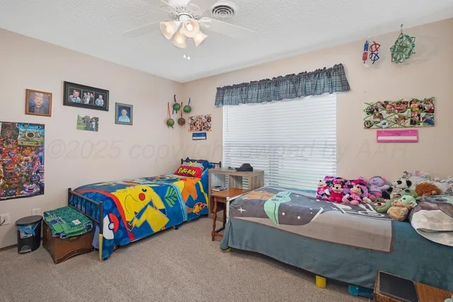 a bedroom with furniture and a couch