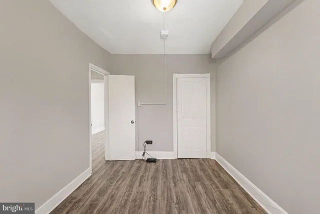 a view of livingroom with hardwood floor and window