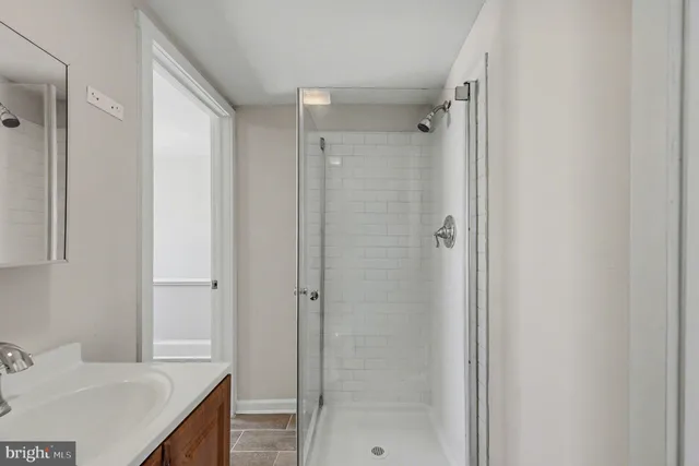 a view of a parking space in front of a building