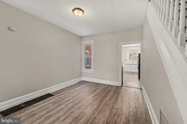 a kitchen with a refrigerator stove and microwave