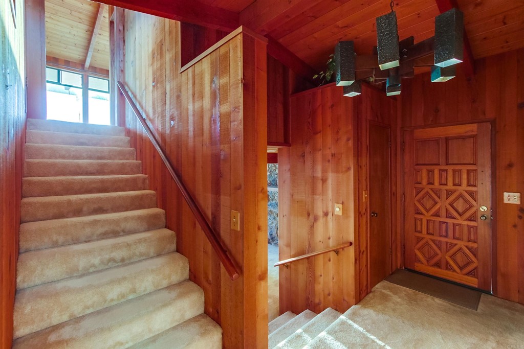 1236 Neptune Avenue Encinitas, CA 92024 - Photo 15 of 40 a view of an entryway with staircase