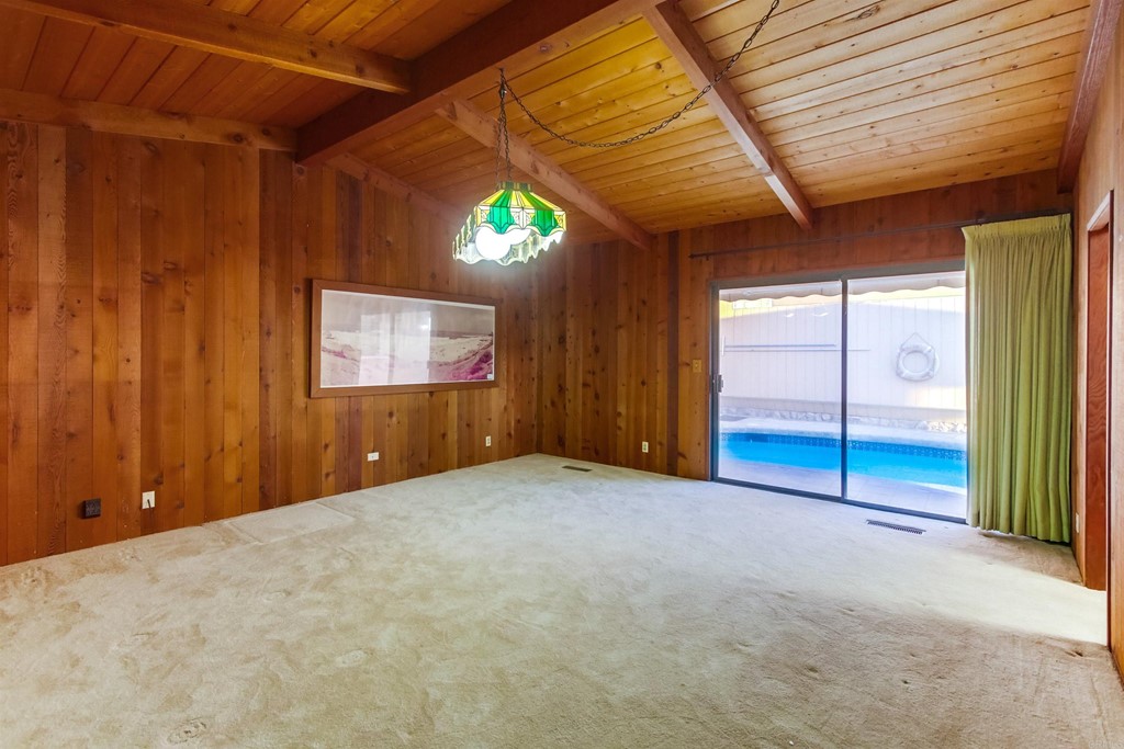 1236 Neptune Avenue Encinitas, CA 92024 - Photo 22 of 40 a view of an empty room with a sliding door